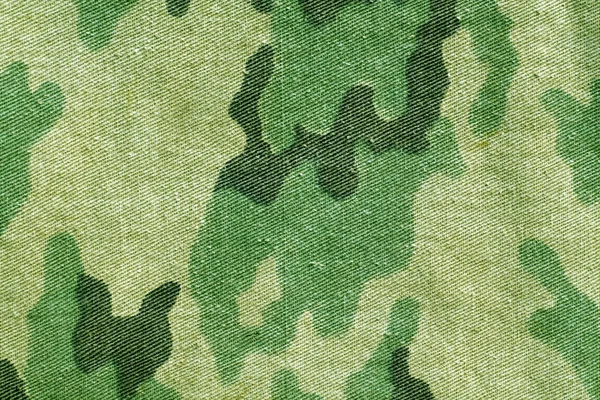 Weathered old camouflage uniform pattern. — Stock Photo, Image