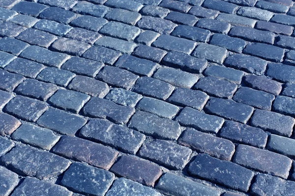 Oude stenen bestrating patroon in blauwe Toon. — Stockfoto
