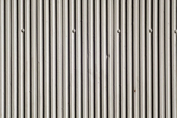 Gri renk alçı duvar doku dikey ışıma ile.