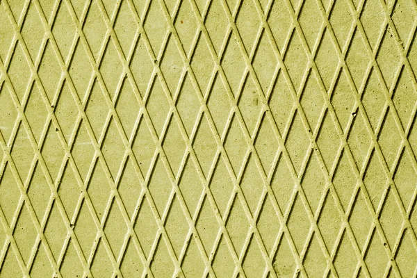 Piso de cimento amarelo com padrão de losango . — Fotografia de Stock