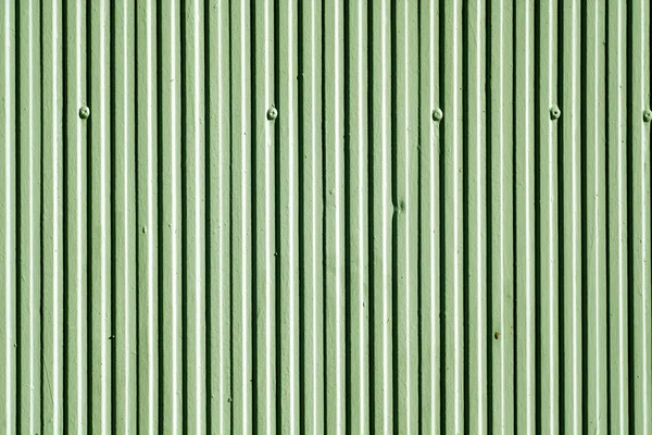 Textura de parede de gesso de cor verde com padrão vertical . — Fotografia de Stock