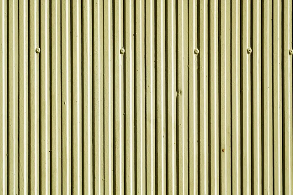 Textura de parede de gesso de cor amarela com padrão vertical . — Fotografia de Stock