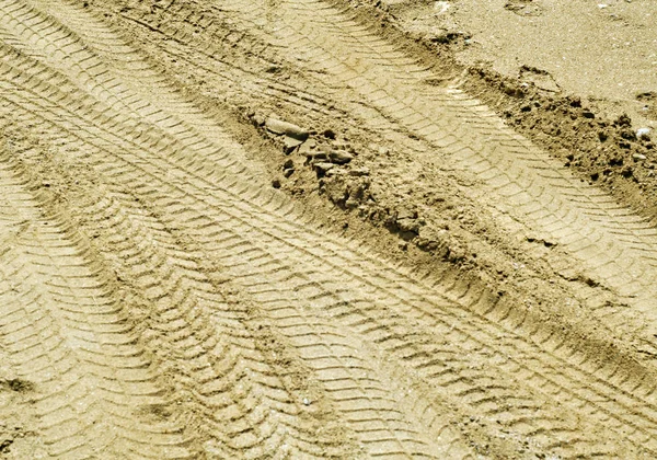 Tyre tracks on sand. — Stock Photo, Image