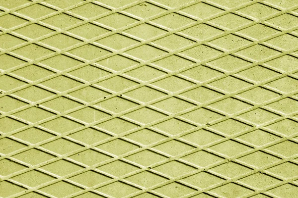Cor amarela piso de cimento com padrão de losango . — Fotografia de Stock