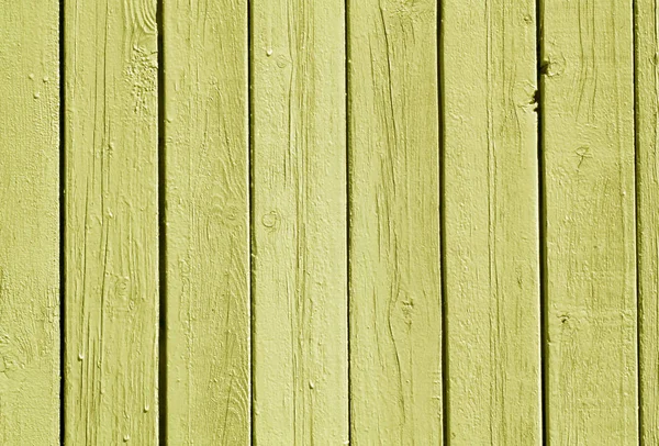 Yellow color wood fence pattern.