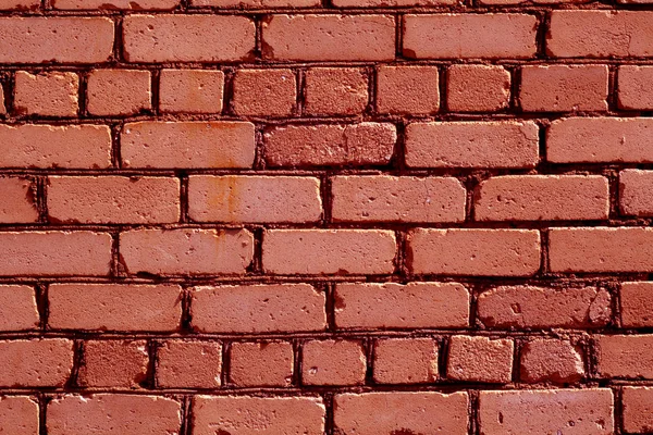Viejo patrón de pared de ladrillo de color rojo áspero . — Foto de Stock