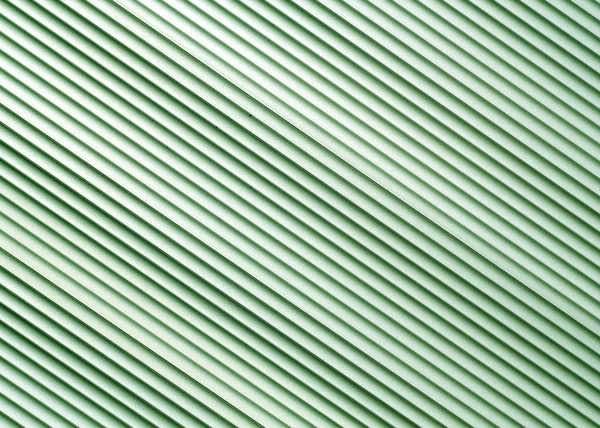 Green color metal warehouse wall pattern. — Stock Photo, Image