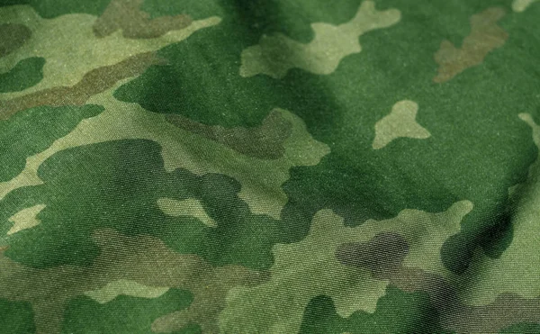 Zelené a hnědé barvě vojenské jednotný vzor s efekt rozostření. — Stock fotografie