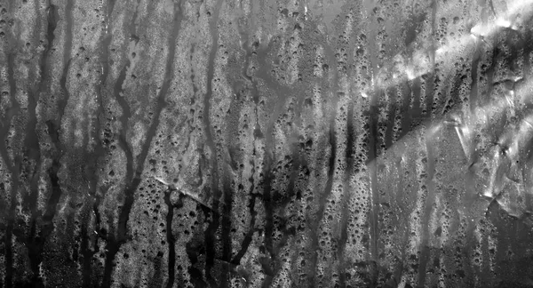 Condensatie druppels op Pvc wrap in zwart-wit. — Stockfoto