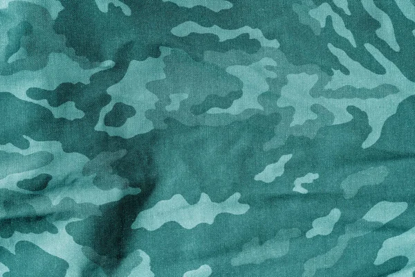 Katonai egységes minta blur effekt cián hangon. — Stock Fotó