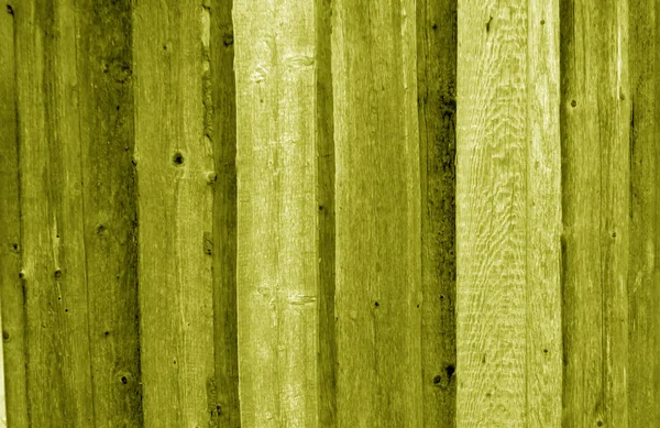 Struttura della recinzione in legno di colore giallo . — Foto Stock