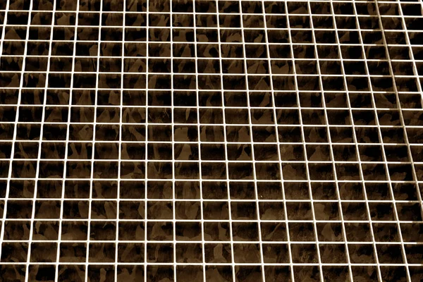 Текстура металлической сетки в коричневом тоне . — стоковое фото