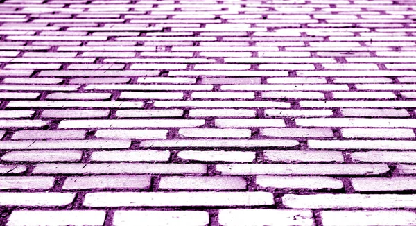 レンガの壁の質感とぼかし紫音の効果. — ストック写真