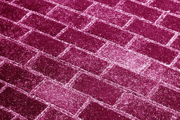 Nieve sobre la textura del pavimento en tono rosa . — Foto de Stock