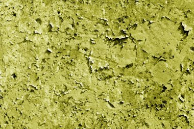 Eski çimento duvar dokusu içinde sarı renk.