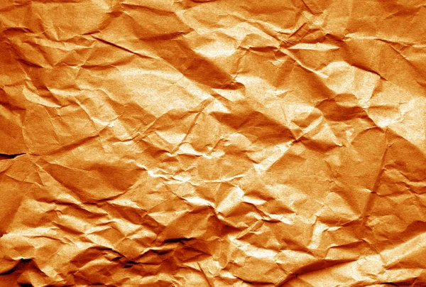 Old paper with wrinckles in orange tone. — Stock Photo, Image