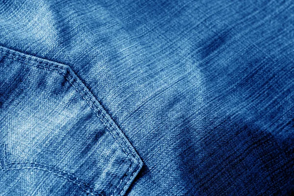 Jeans with pocket with blur effect in navy blue tone. — Stock Photo, Image