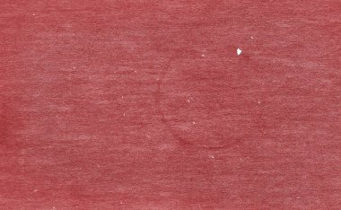 Eski kirli karton yüzeyi kırmızı tonda.