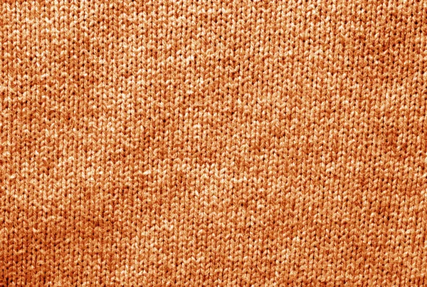 Color knitting pattern in orange color. — Stock Photo, Image