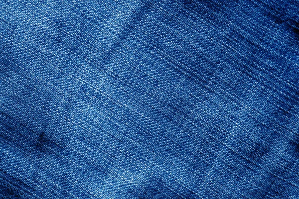 Jeans textur med oskärpa effekt i marinblå färg. — Stockfoto