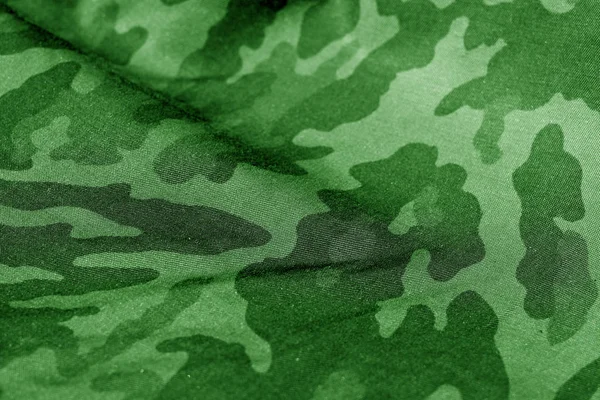 Modello uniforme militare con effetto sfocatura in tono verde . — Foto Stock