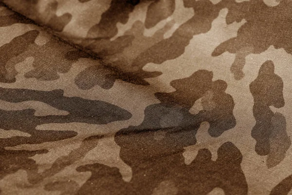 褐色色调的军事统一模式与模糊效果. — 图库照片