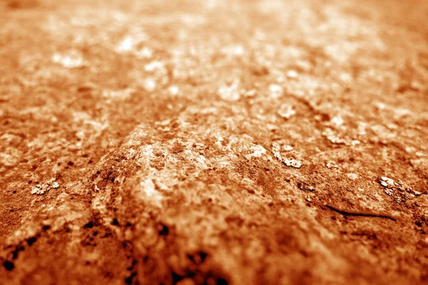 Fondo de piedra de mármol con efecto difuminado en tono naranja . —  Fotos de Stock