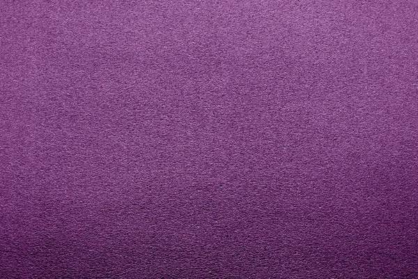 Kunststof glinsterende textuur met wazig effect in paarse kleur. — Stockfoto