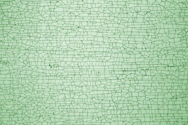 Yeşil tonda metal doku çatlakları.