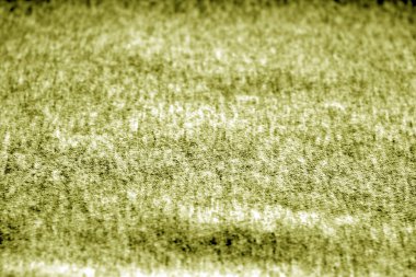 Sarı renkte bulanıklık efektli tekstil dokusu.