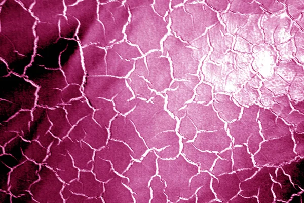 ピンク色のトーンでぼかし効果のある光沢のある革の表面. — ストック写真