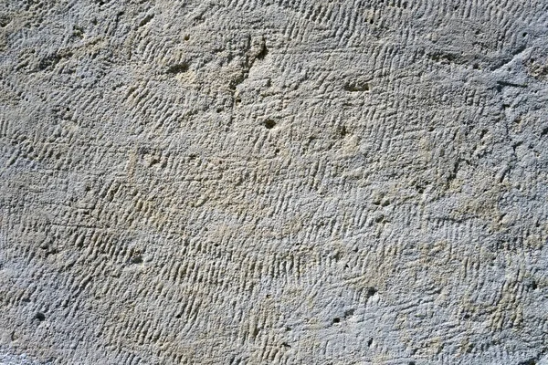 Pískovcové kameny nerovný povrch jako pozadí. — Stock fotografie