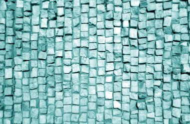 Cyan tonunda taş kaldırım yüzeyi.