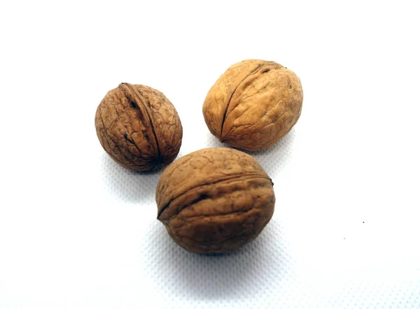 Três wallnuts em branco . — Fotografia de Stock