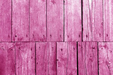 Eski grungy ahşap plakalar pembe tonda arka plan.