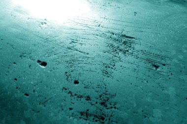 Cyan tonunda bronz heykelin bir parçası..