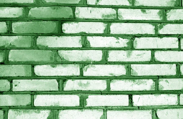 Старая кирпичная текстура стен в зеленом тоне . — стоковое фото