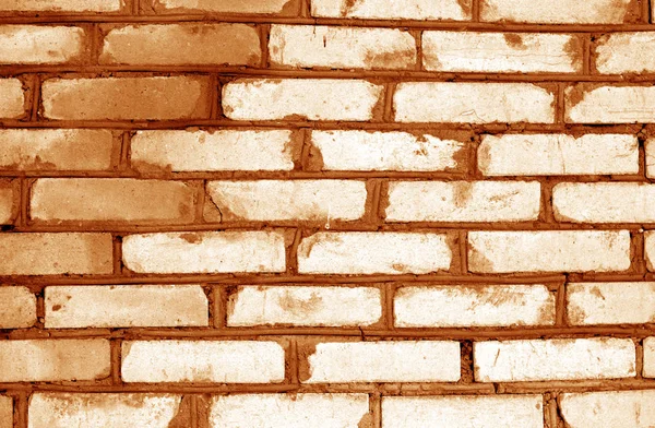 Old grungy brick wall texture in orange tone. — Stock Photo, Image