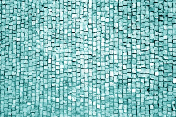 Stone pavement surface in cyan tone. Abstract background and texture for design.