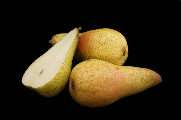 Pears of yellow color on a black background (closeup). Option 3 — Stock Photo, Image