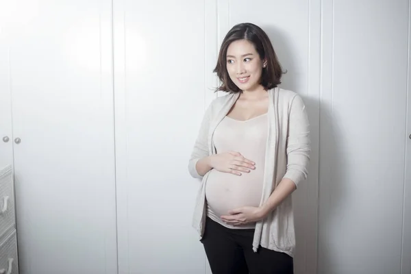 Beautiful Asian Pregnant Woman Expecting Baby Touching Her Belly — Stock Photo, Image