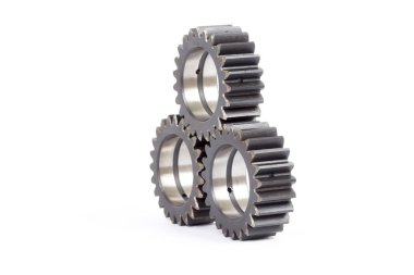 Gears ile dişlerini beyaz bir arka plan üzerinde meşgul küçük grup.