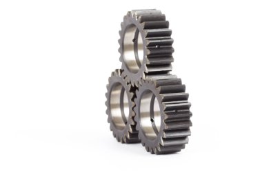 Gears ile dişlerini beyaz bir arka plan üzerinde meşgul küçük grup.
