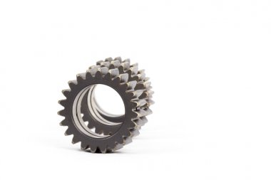 Gears ile dişlerini beyaz bir arka plan üzerinde meşgul küçük grup.
