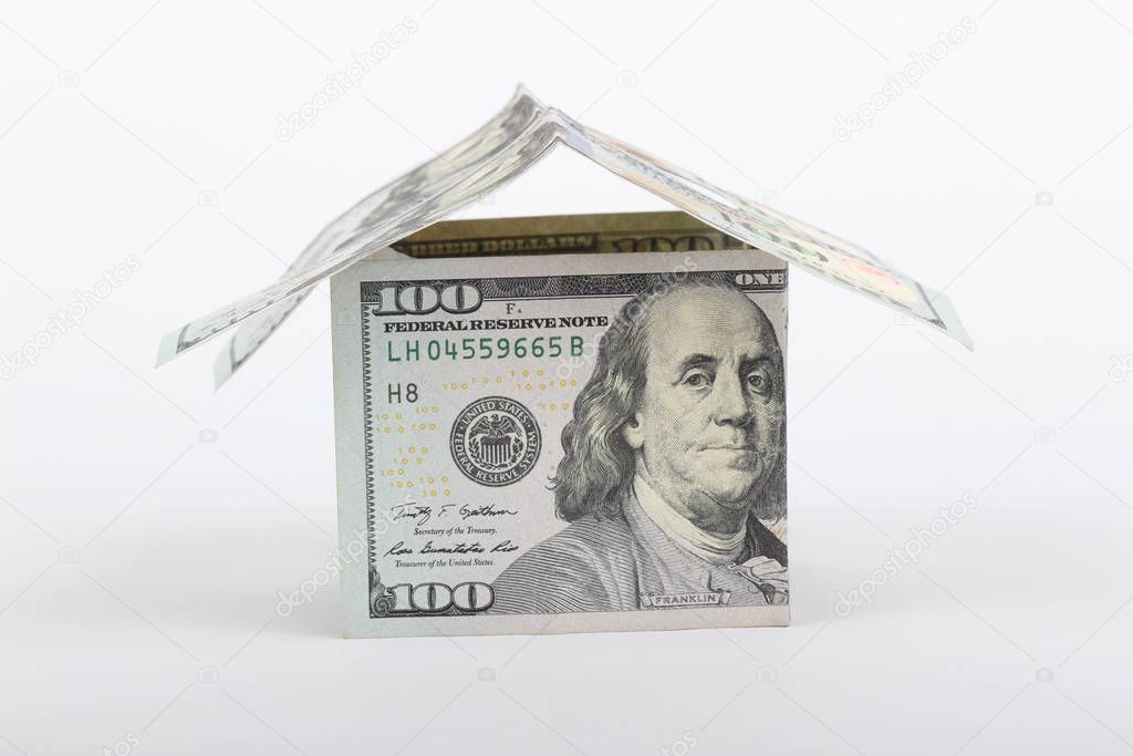 100 dollar house on white background