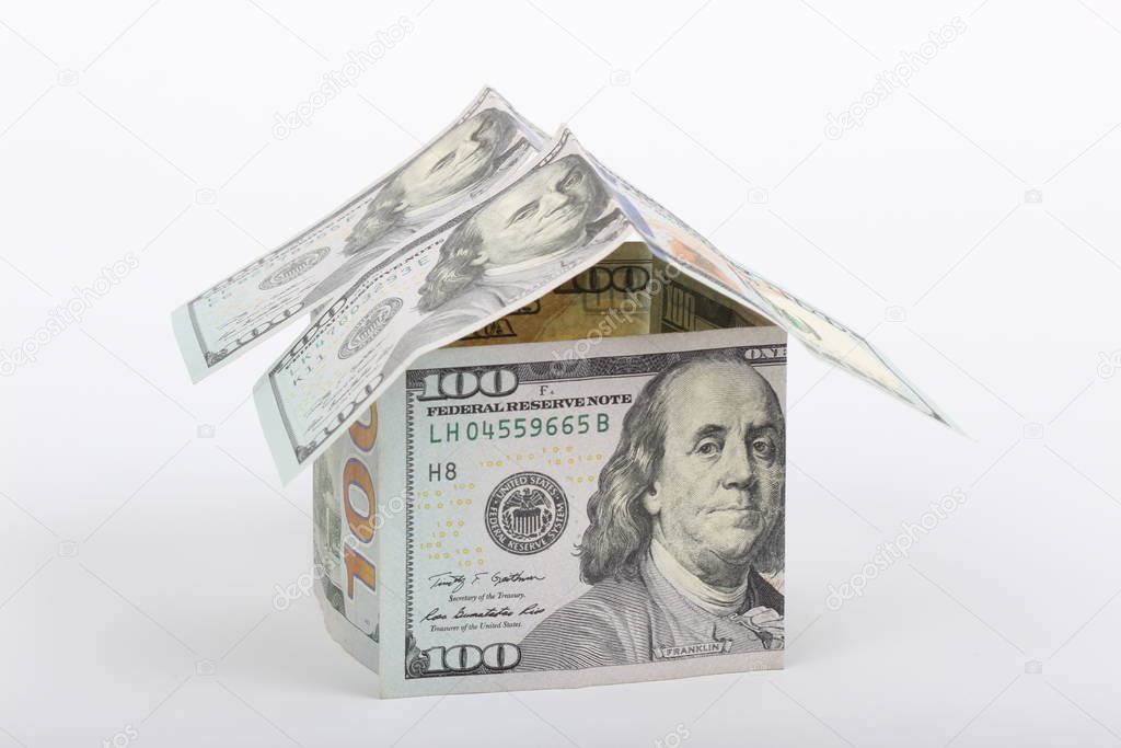 100 dollar house on white background