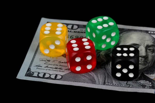 colored DICE on the dollar on black background