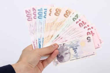 Türkiye beyaz arka planda bir avuç kağıt para