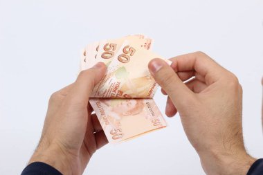 Türkiye beyaz arka planda bir avuç kağıt para