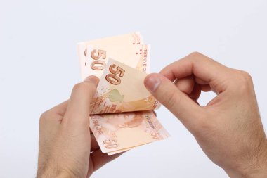 Türkiye beyaz arka planda bir avuç kağıt para